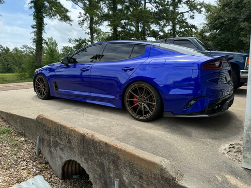 Staggered 20 inch Variant Aure's in Gloss Bronze on a 2019 Kia Stinger