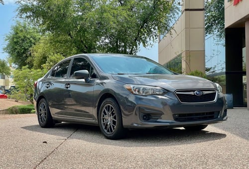 16 inch Touren TR60 in Gunmetal on a 2019 Subaru Impreza