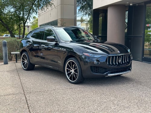 22 inch Staggered Ferrada CM2 Machine Black with Chrome Lip on a 2011 Maserati Levante