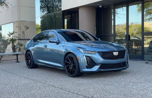 20 inch Staggered Savini Black Di Forza BM15 Gloss Black w/ Double Dark Tint on a 2023 Cadillac CT5-V