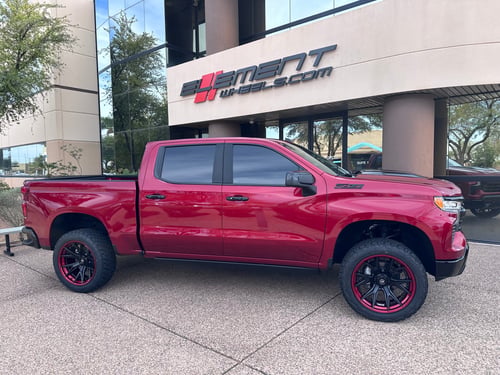 22 inch Fuel Off-Road Catalyst Matte Black w/ Candy Red Lip on a 2024 Chevrolet Silverado 1500 Trail Boss