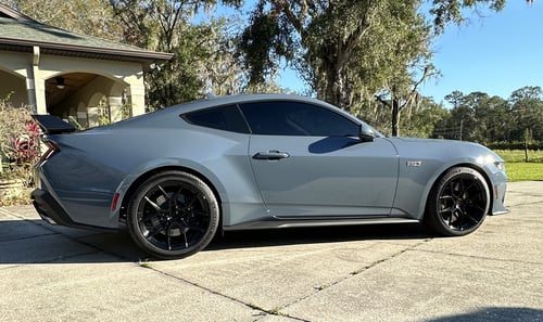 Staggered 20 inch Variant Nysa's in Gloss Black on a 2024 Ford Mustang GT