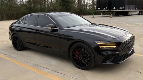 Staggered 20 inch Dolce Performance Pista in Gloss Black on a 2024 Genesis G70