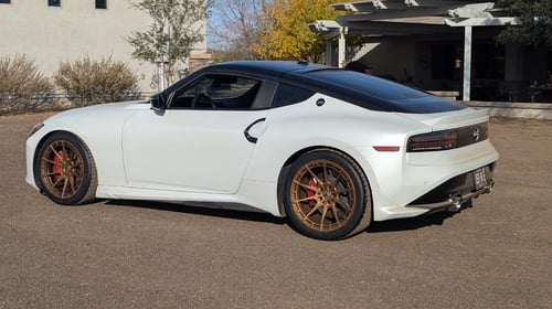 19 inch Staggered Variant Aure's in Gloss Bronze on a 2024 Nissan Z