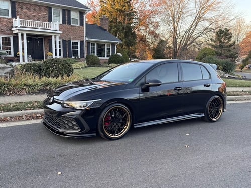 19 inch Variant Maxim-2P in Satin Black w/ Maricopa Copper Lip on a 2024 Volkswagen Golf GTI