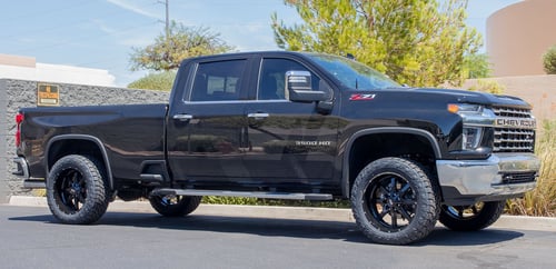 22 inch Moto Metal MO970 Gloss Black Milled Lip on a 2020 Chevrolet Silverado LTZ 3500