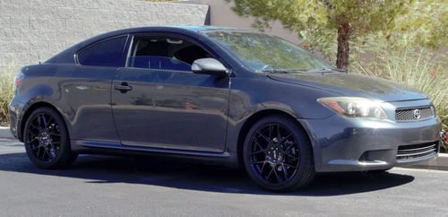 18 Inch Helo He912 Gloss Black on a 2008 Scion TC