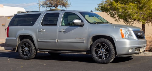 20 inch American Racing AR893 Mainline Gloss Black Machined on a 2013 GMC Yukon 4WD