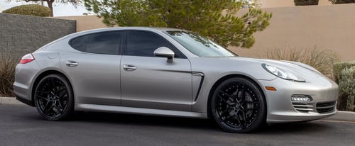 22 inch Staggered Lexani Spike Gloss Black on a 2012 Porsche Panamera 4