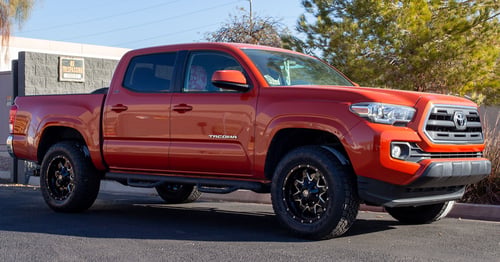 17 inch Mayhem Tank 8040B Gloss Black w/ Milled Spokes on a 2016 Toyota Tacoma