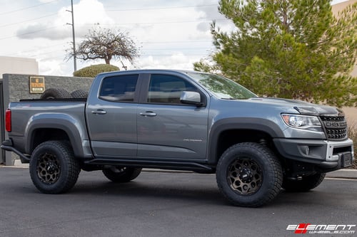 18 inch GRID Off-Road GD8 Matte Black w/ Bronze Dark Tint on a Leveled 2019 Chevrolet Colorado