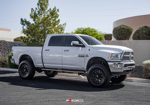 18 inch Moto Metal MO962 Gloss Black Milled on a Lifted 2014 Dodge Ram 2500