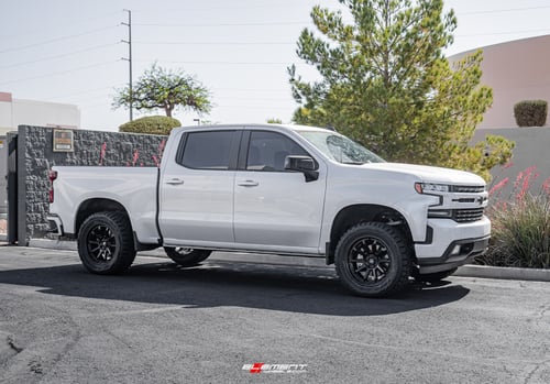 20 inch Fuel Off-Road Torque Matte Black D689 on a Leveled 2021 Chevrolet Silverado 1500