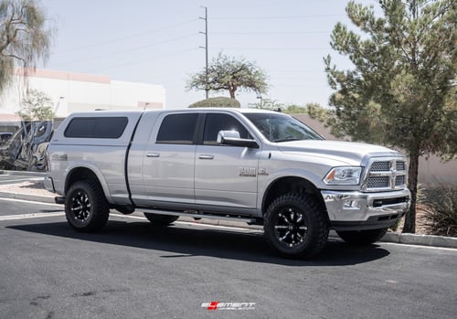 18 inch RBP 94R Gloss Black w/ Chrome Accents on a Leveled 2017 Dodge Ram 2500