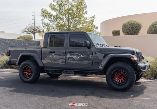 18 inch KMC KM540 Recon Gloss Black Machined w/ Red Tint on a Lifted 2021 Jeep Gladiator