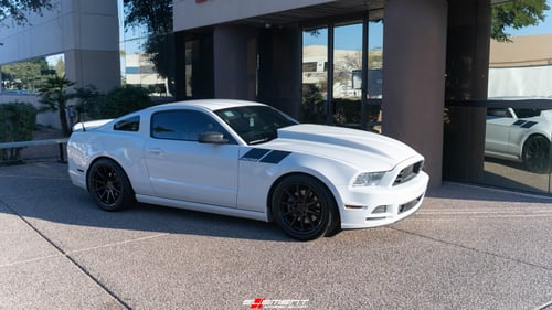 Staggered 19 Inch Niche Essen in Matte Black on a 2014 Ford Mustang