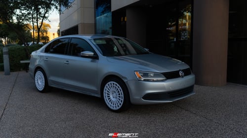 18 Inch Fifteen52 Integrale in Rally White on a 2014 Volkswagen Jetta VI