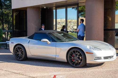 Staggered 20 Inch Savini SV-F6 In Gloss Black Double Dark Tint on a 2006 Chevrolet Corvette C6