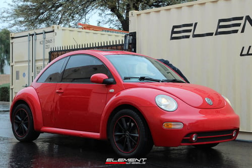17 inch NS NS9012 Matte Black w/ Red Stripe on a 2002 Volkswagen Beetle Turbo