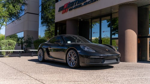 Staggered 20 Inch Variant Radon in Titanium Brushed Face on a 2017 Porsche Cayman S