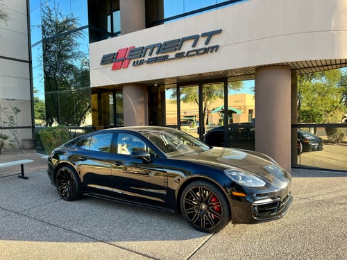 22 inch Staggered Curva Concepts C48 Gloss Black on a 2018 Porsche Panamera Turbo