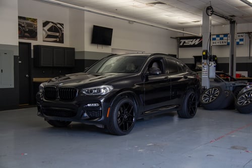 Staggered 20 Inch Giovanna Caleb in Gloss Black on a 2019 BMW X4