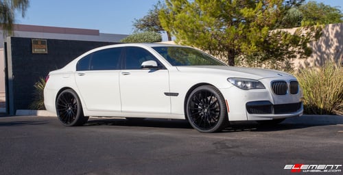 Staggered 22 Inch Savini BM16 in Gloss Black on a 2015 BMW 740LD X-Drive