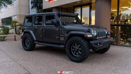 20 Inch Moto Metal MO970 in Gloss Gray w/ Gloss Black Lip on a 2019 Jeep Wrangler JL
