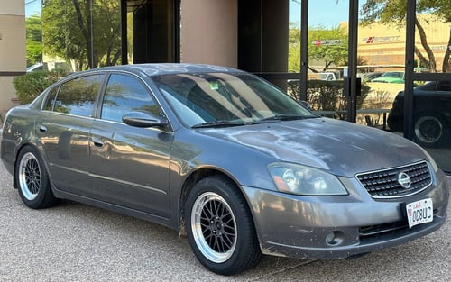 17 inch Vors VR8 Hyper Black on a 2006 Nissan Altima