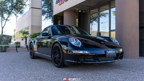 Staggered 19 Inch Variant Radon in a Gloss Piano Black on a 2006 Porsche 911 4S Carrera 997