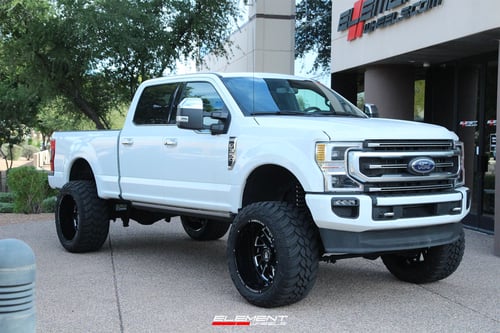 24 inch American Truxx AT1905 Blade Matte Black Milled on a Lifted 2021 Ford F-350