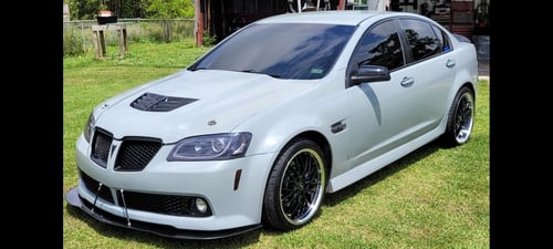 Double Staggered MRR GT1 In Gloss Black w/Machined Lip on a 2009 Pontiac G8
