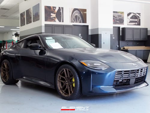 19 inch Staggered Variant Helium Satin Bronze on a 2023 Nissan Z Prototype