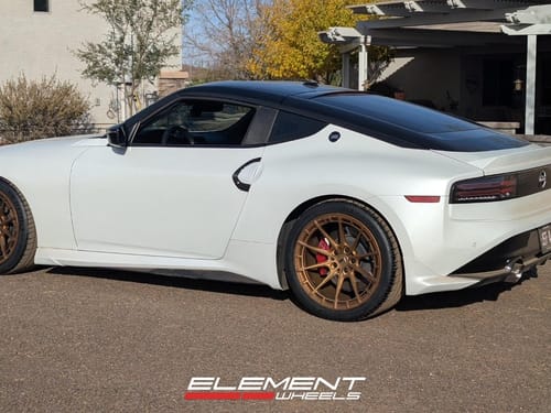 19 inch Staggered Variant Aure in Gloss Bronze on a 2024 Nissan Z