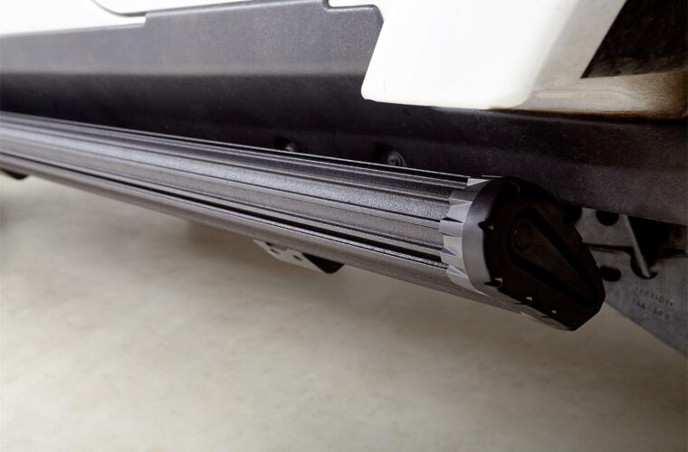 amp research 2007-2018 jeep wrangler jku 4dr powerstep xl - black (incl oem style illumination) 77122-01a