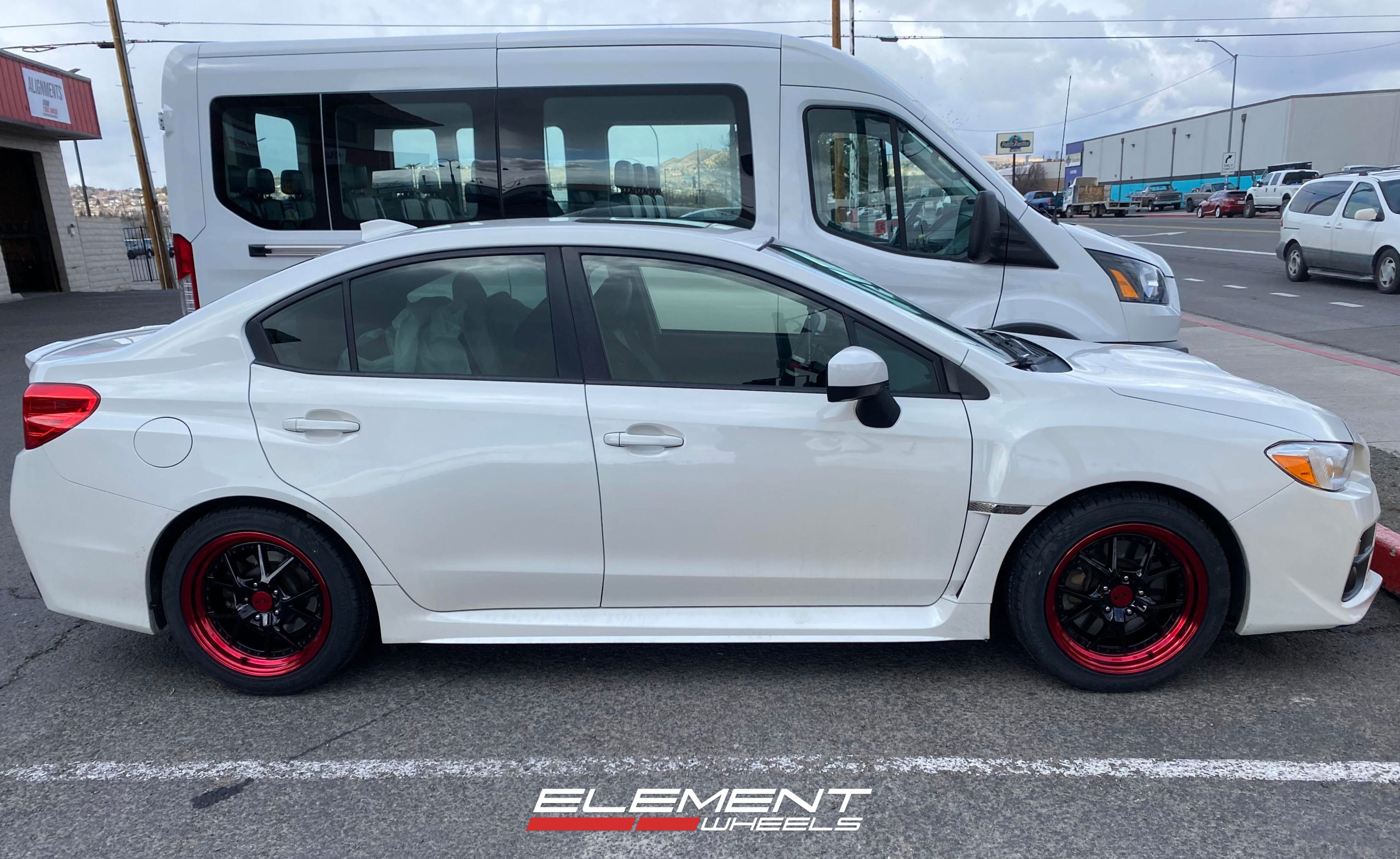 17 inch F1R F105 Gloss Black w/ Red Lip on a 2015 Subaru WRX