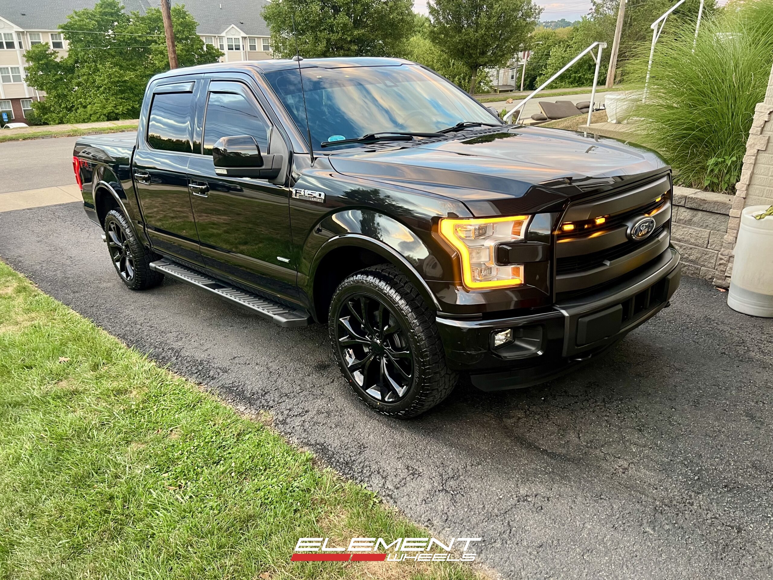 22x9.5 OE Concepts Replica 2018 Ford Platinum in Gloss Black FD05 on a 2015 Ford F-150