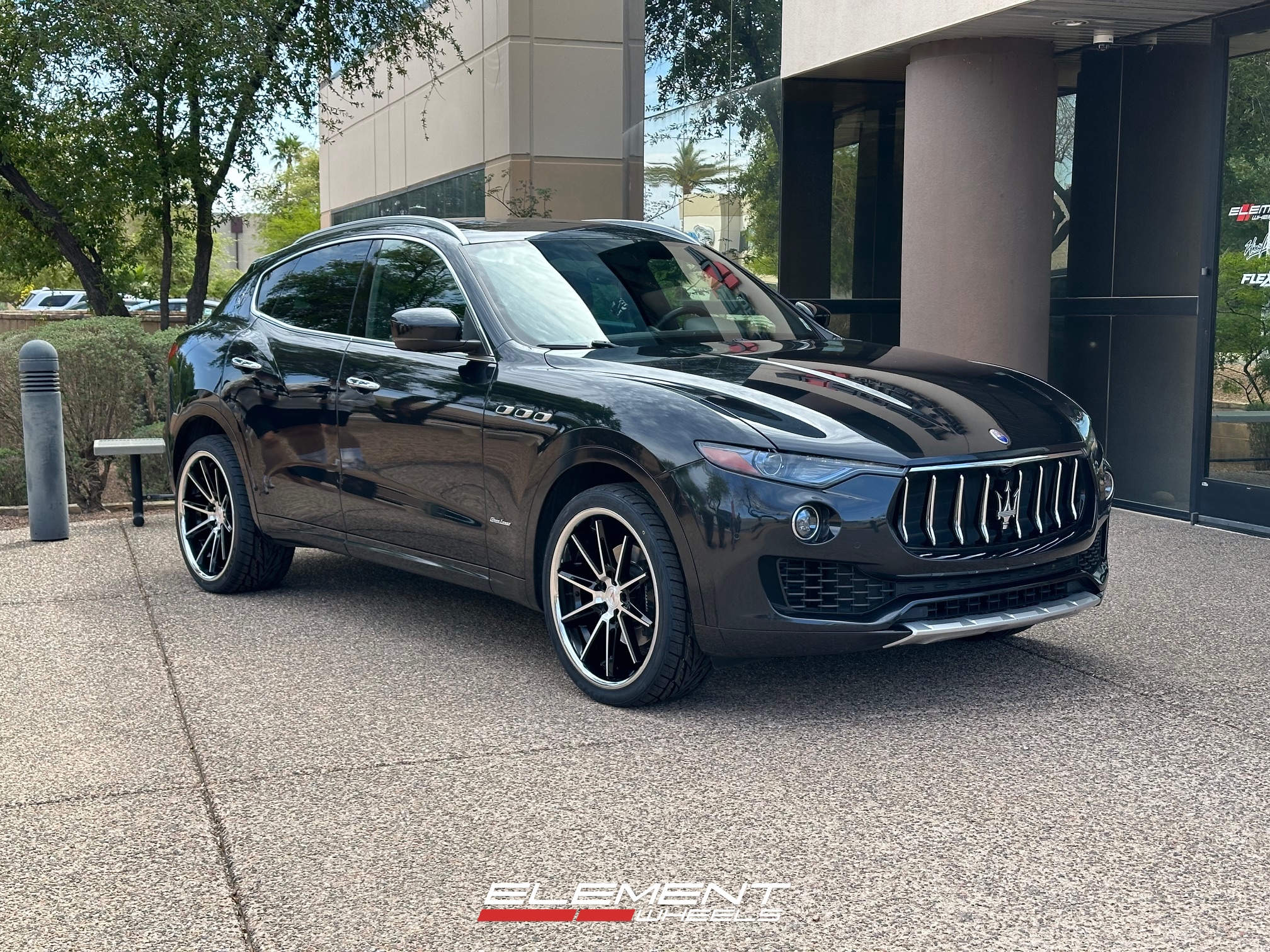 22 inch Staggered Ferrada CM2 Machine Black with Chrome Lip on a 2021 Maserati