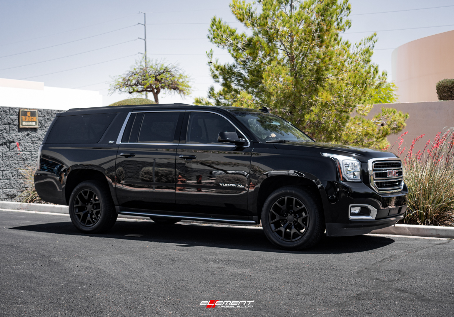 20 inch GMC Sierra Replica Wheel Satin Black FR44 on a 2019 GMC Yukon XL
