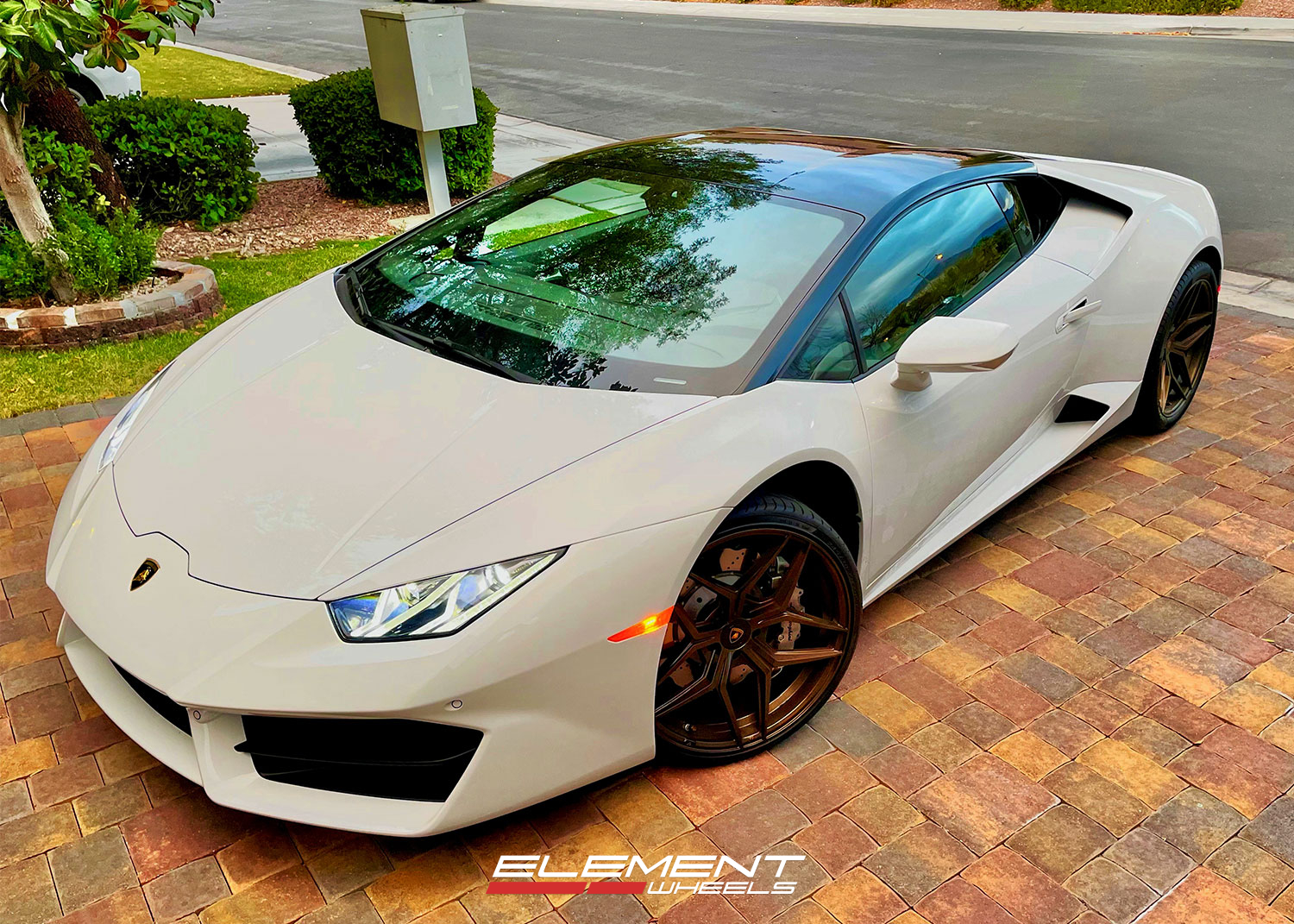 20 inch Staggered Variant Xenon Gloss Metallic Bronze on a 2017 Lamborghini Huracan