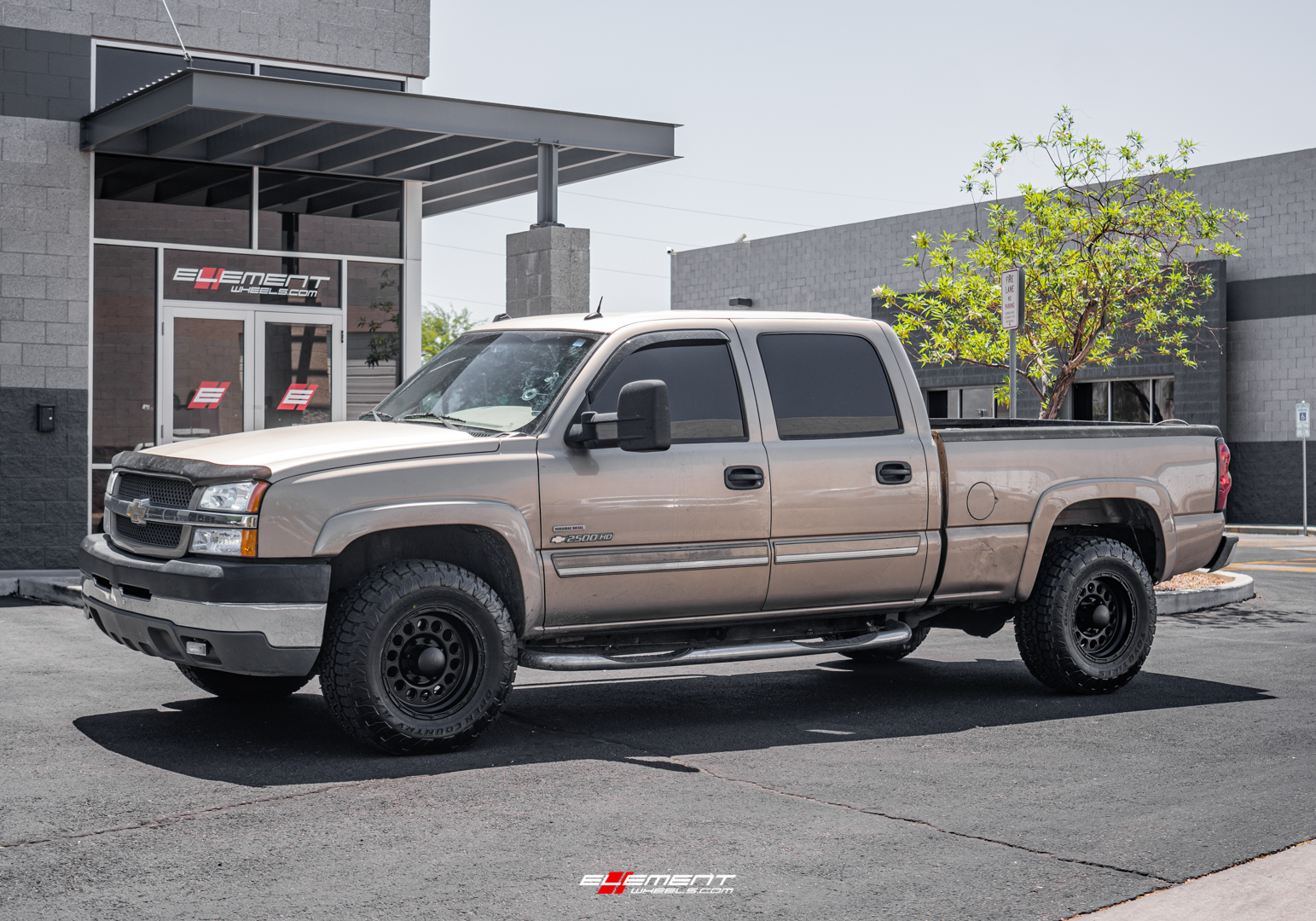 17 inch Raceline 887B Rockcrusher Matte Black on a 2004 Chevrolet Silverado 2500
