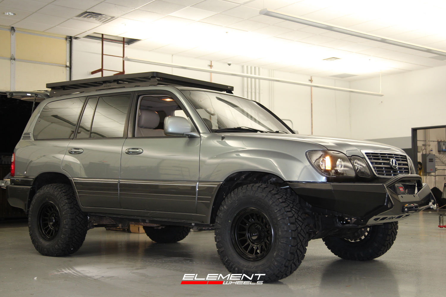 16 inch KMC KM542 Impact Satin Black on a 2002 Lexus LX470