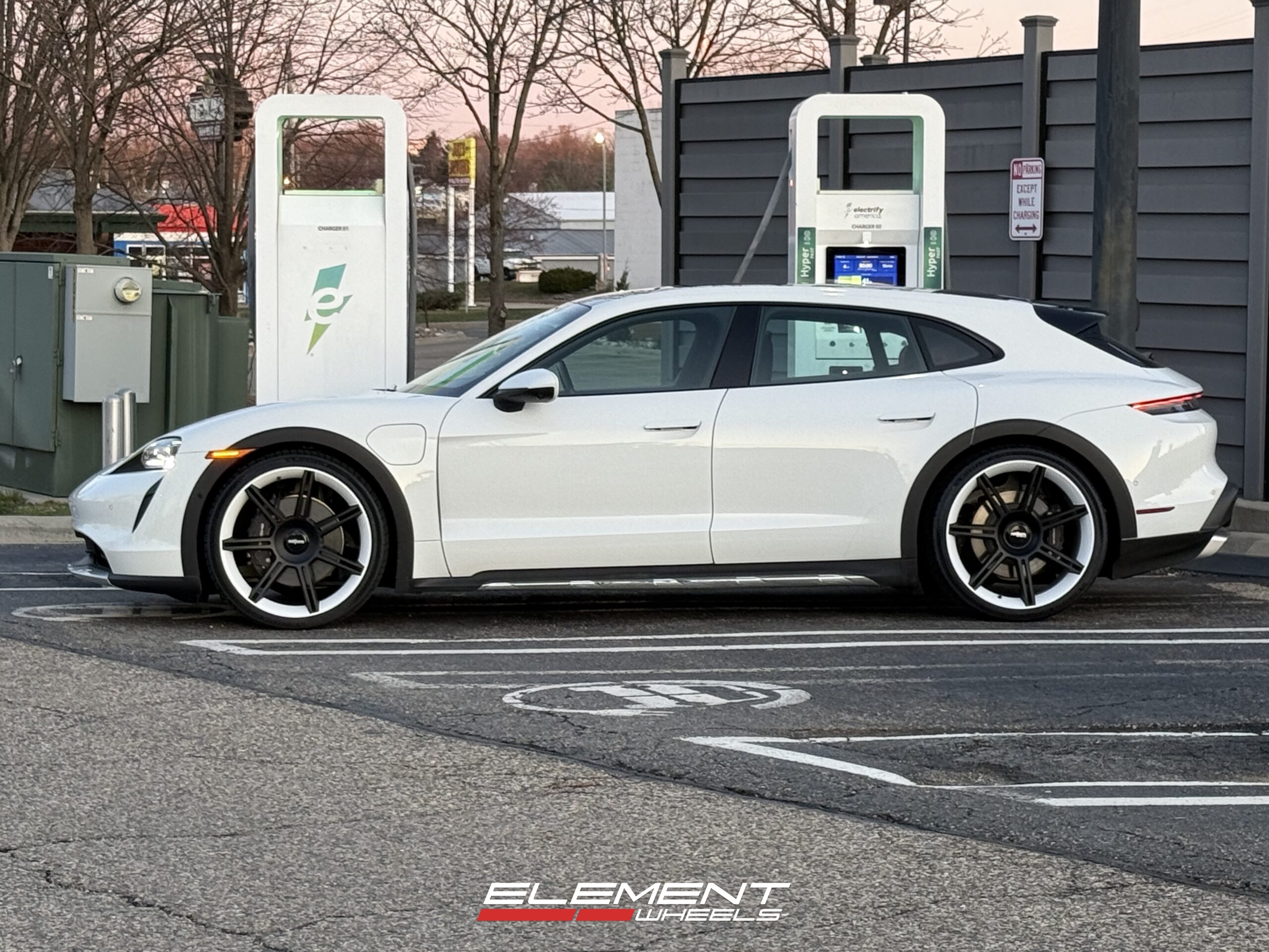 Staggered 22 Inch Rotiform Forged FRA Gloss White w/ Matte Black Spokes on a 2022 Porsche Taycan