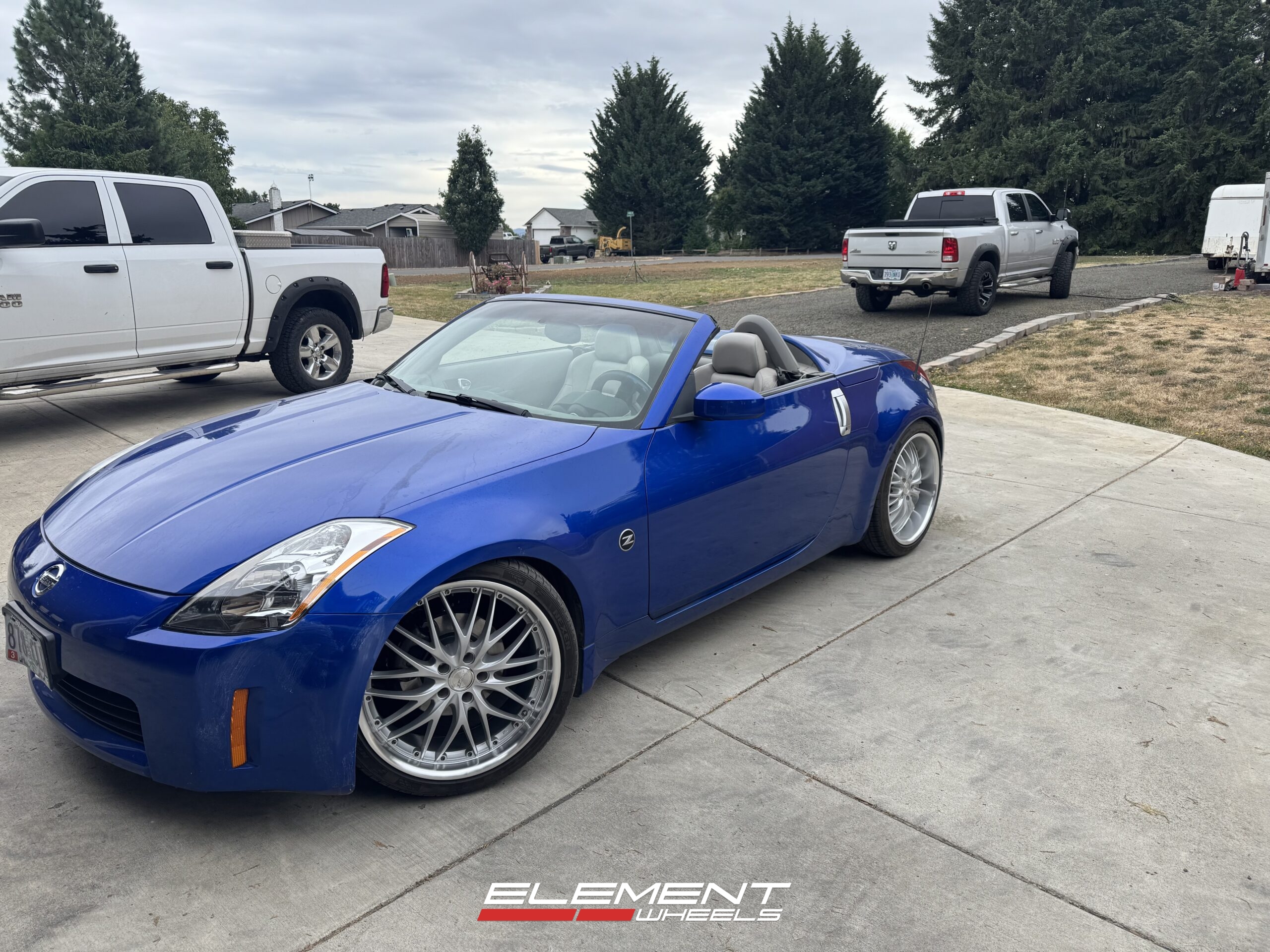 Staggered 20 inch MRR GT1 in Hyper Silver on a 2006 Nissan 350Z