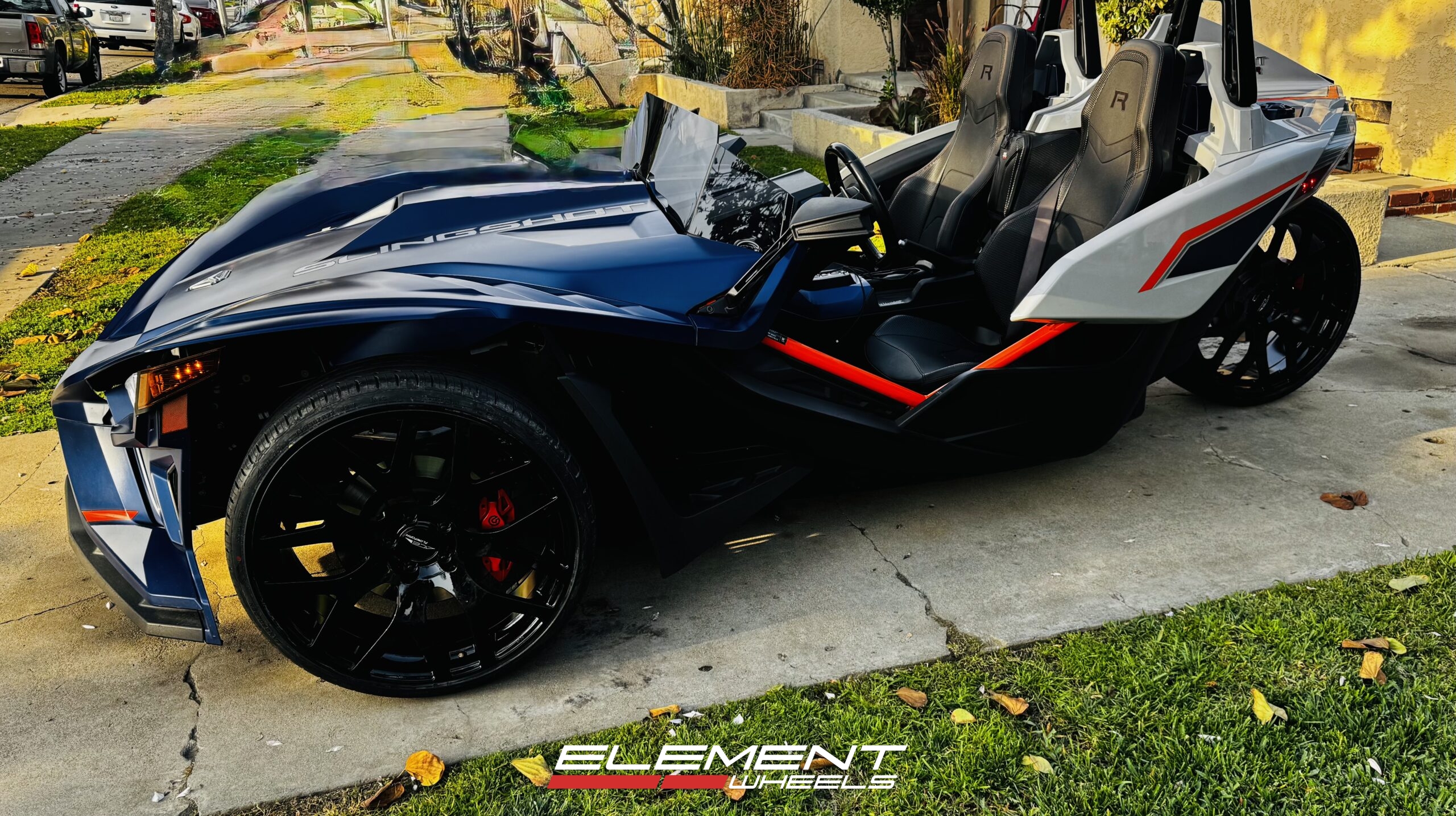 22 inch Ace Alloy AFF07 in Gloss Piano Black on a 2022 Polaris Slingshot